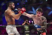 16 December 2016; Brian Moore, right, in action against Daniel Weichel during their featherweight bout at Bellator 169 in the 3 Arena in Dublin. Photo by Ramsey Cardy/Sportsfile