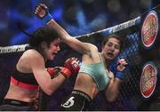 16 December 2016; Sinead Kavanagh, left, in action against Elina Kallionidou during their featherweight bout at Bellator 169 in the 3 Arena in Dublin. Photo by Ramsey Cardy/Sportsfile