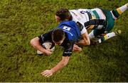 17 December 2016; Luke McGrath of Leinster goes over to score his side's second try despite the efforts of James Wilson of Northampton Saints during the European Rugby Champions Cup Pool 4 Round 4 match between Leinster and Northampton Saints at the Aviva Stadium, Dublin. Photo by Piaras Ó Mídheach/Sportsfile