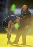 13 May 2011; Brian O'Driscoll, Leinster, in the company of Dr. Jim McShane, holds his knee after picking up an injury which forced him to be replaced at half time. Celtic League Semi-Final, Leinster v Ulster, RDS, Ballsbridge, Dublin. Picture credit: Stephen McCarthy / SPORTSFILE