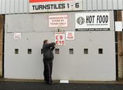 14 May 2011; Omagh St. Enda's GAA club official Mark Nelson putting up signs before the game. Ulster GAA Hurling Senior Championship, First Round, Tyrone v Derry, Healy Park, Omagh, Co. Tyrone. Picture credit: Oliver McVeigh / SPORTSFILE