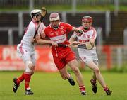 14 May 2011; Oisin McCloskey, Derry, in action against Brian McGilloway and Conor Grogan, Tyrone. Ulster GAA Hurling Senior Championship, First Round, Tyrone v Derry, Healy Park, Omagh, Co. Tyrone. Picture credit: Oliver McVeigh / SPORTSFILE
