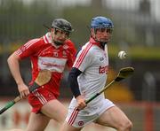 14 May 2011; Martin Grogan, Tyrone, in action against Alan Grant, Derry. Ulster GAA Hurling Senior Championship, First Round, Tyrone v Derry, Healy Park, Omagh, Co. Tyrone. Picture credit: Oliver McVeigh / SPORTSFILE