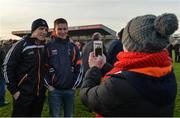 18 December 2016; Armagh manager Kieran McGeeney poses for a picture with a supporter after the O'Fiaich Cup Final game between Armagh and Tyrone at Oliver Plunkett Park in Crossmaglen, Co. Armagh. Photo by Oliver McVeigh/Sportsfile