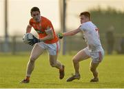 18 December 2016; Charlie Vernon of Armagh in action against Conor Meyler of Tyrone during the O'Fiaich Cup Final game between Armagh and Tyrone at Oliver Plunkett Park in Crossmaglen, Co. Armagh. Photo by Oliver McVeigh/Sportsfile