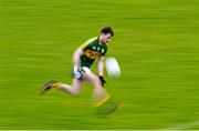 10 January 2016; Tom O'SullEvan, Kerry, solos the ball upfield during the game. McGrath Cup, Group A, Round 2, Kerry v Clare, Fitzgerald Stadium, Killarney, Co. Kerry. Photo by Brendan Moran/Sportsfile