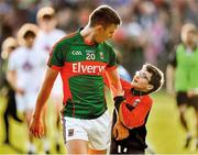 16 July 2016; Barry Moran of Mayo is greeted by a young supporter Daniel McHale following the GAA Football All-Ireland Senior Championship Round 3B match between Mayo and Kildare at Elverys MacHale Park in Castlebar, Mayo. Photo by Stephen McCarthy/Sportsfile