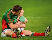 1 October 2016; A dejected Andy Moran of Mayo with his daughter Charlotte at the end of the GAA Football All-Ireland Senior Championship Final Replay match between Dublin and Mayo at Croke Park in Dublin. Photo by David Maher/Sportsfile
