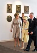 18 May 2011; HM Queen Elizabeth II, centre, and President of Ireland Mary McAleese are escorted by Uachtarán CLG Criostóir Ó Cuana as they walk past plaque's commemorating Archbishop Dr. Croke, Michael Cusack and Maurice Davin during the Queen's visit to Croke Park. State Visit to Ireland by Her Majesty Queen Elizabeth II & His Royal Highness The Duke of Edinburgh, Croke Park, Dublin. Picture credit: Brendan Moran / SPORTSFILE