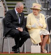 18 May 2011; HM Queen Elizabeth II in conversation with Uachtarán CLG Criostóir Ó Cuana as they sit by the pitch. State Visit to Ireland by Her Majesty Queen Elizabeth II & His Royal Highness The Duke of Edinburgh, Croke Park, Dublin. Picture credit: Stephen McCarthy / SPORTSFILE