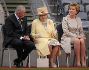 18 May 2011; HM Queen Elizabeth II in conversation with Uachtarán CLG Criostóir Ó Cuana, left, and the President of Ireland Mary McAleese as they sit by the pitch. State Visit to Ireland by Her Majesty Queen Elizabeth II & His Royal Highness The Duke of Edinburgh, Croke Park, Dublin. Picture credit: Stephen McCarthy / SPORTSFILE