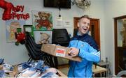 21 December 2016; Dublin footballer Jonny Cooper lends a hand packing some of the 3,000 Christmas parcels for the homeless at the Capuchin Day Centre on Bow Street, Dublin. Photo by Piaras Ó Mídheach/Sportsfile