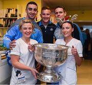 25 December 2016; Dublin players James McCarthy, Ciaran Kilkenny and Stephen Cluxton with staff nurses Sarah McCormack and Fiona Little and the Sam Maguire Cup during a visit to Beaumont Hospital in Beaumount, Dublin.  Photo by Ray McManus/Sportsfile