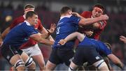 26 December 2016; CJ Stander of Munster is tackled by Tadhg Furlong, centre, and Dan Leavy of Leinster during the Guinness PRO12 Round 11 match between Munster and Leinster at Thomond Park in Limerick. Photo by Brendan Moran/Sportsfile