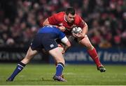 26 December 2016; CJ Stander of Munster is tackled by Rory O'Loughlin of Leinster during the Guinness PRO12 Round 11 match between Munster and Leinster at Thomond Park in Limerick. Photo by Brendan Moran/Sportsfile