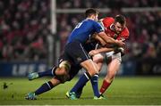 26 December 2016; Rory Scannell of Munster is tackled by Mike McCarthy and Ross Byrne of Leinster during the Guinness PRO12 Round 11 match between Munster and Leinster at Thomond Park in Limerick. Photo by Brendan Moran/Sportsfile