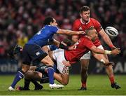 26 December 2016; Simon Zebo of Munster is tackled by Rory O'Loughlin and Isa Nacewa of Leinster during the Guinness PRO12 Round 11 match between Munster and Leinster at Thomond Park in Limerick. Photo by Brendan Moran/Sportsfile