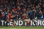 26 December 2016; Tommy O’Donnell of Munster takes the ball ahead of Barry Daly of Leinster on the way to scoring his side's third try during the Guinness PRO12 Round 11 match between Munster and Leinster at Thomond Park in Limerick. Photo by Brendan Moran/Sportsfile