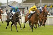 21 May 2011; Janey Muddles, left, with Kevin Manning up, on their way to winning the Stay at the Brandon Hotel Tralee European Breeders Fund Fillies Maiden, behind eventual 2nd Belle Passe, with William Lee up. Curragh Racecourse, Curragh, Co. Kildare. Photo by Sportsfile