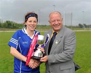 21 May 2011; Munster Captain Valerie Mulcahy accepts the cup from Pat Quill, Uachtaran Cumann Peil Gael na mBan. MMI Group Ladies Football Interprovincial Championship Finals, Interprovincial Final, Munster v Ulster, Pairc Chiarain, Athlone, Co. Westmeath. Picture credit: Oliver McVeigh / SPORTSFILE