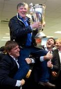 21 May 2011; RTÉ broadcaster Pat Kenny is carried shoulder high by Paul O'Donohoe and Shane Horgan in Cardiff Airport after Leinster's Heineken Cup Final victory over Northampton Saints. Cardiff Airport, Wales. Picture credit: Ray McManus / SPORTSFILE