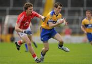 22 May 2011; Mark McCarthy, Clare, in action against Rory Buckley, Cork. Munster GAA Football Junior Championship Quarter-Final, Cork v Clare, Pairc Ui Chaoimh, Cork. Picture credit: Pat Murphy / SPORTSFILE