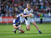 22 May 2011; Brian Kavanagh, Longford, in action against Colm Begley, Laois. Leinster GAA Football Senior Championship First Round, Laois v Longford, O'Moore Park, Portlaoise, Co. Laois. Picture credit: Barry Cregg / SPORTSFILE