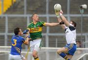 22 May 2011; Tipperary goalkeeper Matthew O'Donnell, supported by Paddy Codd, wins possession ahead of Kieran Donaghy, Kerry. Munster GAA Football Senior Championship Quarter-Final, Kerry v Tipperary, Fitzgerald Stadium, Killarney, Co. Kerry. Picture credit: Diarmuid Greene / SPORTSFILE