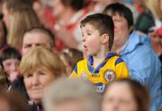 22 May 2011; A young Clare supporter watches the game. Munster GAA Football Senior Championship Quarter-Final, Cork v Clare, Pairc Ui Chaoimh, Cork. Picture credit: Pat Murphy / SPORTSFILE