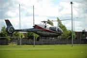 22 May 2011; The Westmeath manager Brian Hanley arrives at Dr Cullen Park, back pitch, in a helicopter. Leinster GAA Hurling Senior Championship First Round, Carlow v Westmeath, Dr. Cullen Park, Carlow. Picture credit: Ray McManus / SPORTSFILE