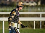 28 December 2016; Jockey Patrick Mullins returns to the paddock after falling from Shaneshill at the last hurdle during the Squared Financial Christmas Hurdle during day three of the Leopardstown Christmas Festival in Leopardstown, Dublin. Photo by Seb Daly/Sportsfile