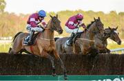 28 December 2016; Outlander, left, with Jack Kennedy up, jumps the last alongside Valseur Lido, with Bryan Cooper up, on their way to winning the Lexus Steeplechase during day three of the Leopardstown Christmas Festival in Leopardstown, Dublin. Photo by Seb Daly/Sportsfile