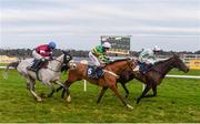 29 December 2016; Our Duke, with Robbie Power up, races ahead of Coney Island, with Barry Geraghty up, centre, and Disko, with Jonathan Moore up, left, on their way to winning the Neville Hotels Novice Steeplechase during day four of the Leopardstown Christmas Festival in Leopardstown, Dublin. Photo by Eóin Noonan/Sportsfile