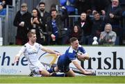 31 December 2016; Rory O'Loughlin of Leinster goes over to score his side's first try despite the attention of Paul Marshall of Ulster during the Guinness PRO12 Round 12 match between Leinster and Ulster at the RDS Arena in Dublin. Photo by Stephen McCarthy/Sportsfile