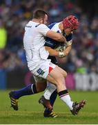 31 December 2016; Josh van der Flier of Leinster is tackled by Andy Warrick of Ulster during the Guinness PRO12 Round 12 match between Leinster and Ulster at the RDS Arena in Dublin. Photo by Stephen McCarthy/Sportsfile