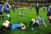 21 May 2011; Leinster players Cian Healy, Sean O'Brien and Jamie Heaslip sit on the pitch after the game. Heineken Cup Final, Leinster v Northampton Saints, Millennium Stadium, Cardiff, Wales. Picture credit: Brendan Moran / SPORTSFILE