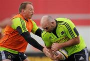 24 May 2011; Munster's John Hayes is tackled by Mick O'Driscoll during squad training ahead of their Celtic League Grand Final against Leinster on Saturday. Munster Rugby Squad Training, Thomond Park, Limerick. Picture credit: Diarmuid Greene / SPORTSFILE