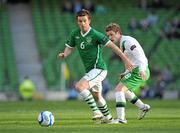 24 May 2011; Kevin Foley, Republic of Ireland, in action against Steven Davis, Northern Ireland. Carling Four Nations Tournament, Republic of Ireland v Northern Ireland, Aviva Stadium, Lansdowne Road, Dublin. Picture credit: Barry Cregg / SPORTSFILE