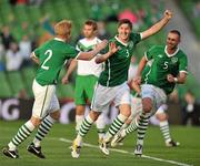 24 May 2011; Republic of Ireland's Stephen Ward celebrates with team-mates Paul McShane, left, and Damien Delaney, right, after scoring his side's first goal. Carling Four Nations Tournament, Republic of Ireland v Northern Ireland, Aviva Stadium, Lansdowne Road, Dublin. Picture credit: David Maher / SPORTSFILE