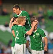 24 May 2011; Republic of Ireland's Stephen Ward, hidden, celebrates with team-mates Paul McShane, 2, Simon Cox, 9, and Keith Andrews, back, after scoring his side's first goal. Carling Four Nations Tournament, Republic of Ireland v Northern Ireland, Aviva Stadium, Lansdowne Road, Dublin. Picture credit: David Maher / SPORTSFILE