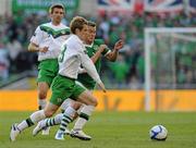 24 May 2011; Simon Cox, Republic of Ireland, and Steven Davis, Northern Ireland, battle for possession. Carling Four Nations Tournament, Republic of Ireland v Northern Ireland, Aviva Stadium, Lansdowne Road, Dublin. Picture credit: Brian Lawless / SPORTSFILE