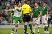 24 May 2011; Northern Ireland's gareth McAuley remonstates with referee Craig Thomson after he sent off his team-mate Adam Thmpson following a foul on Republic of Ireland's Robbie Keane. Carling Four Nations Tournament, Republic of Ireland v Northern Ireland, Aviva Stadium, Lansdowne Road, Dublin. Picture credit: Brian Lawless / SPORTSFILE