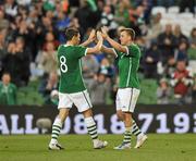 24 May 2011; Simon Cox, right, Republic of Ireland, celebrates with team-mate Keith Andrews after scoring his side's fifth goal. Carling Four Nations Tournament, Republic of Ireland v Northern Ireland, Aviva Stadium, Lansdowne Road, Dublin. Picture credit: David Maher / SPORTSFILE