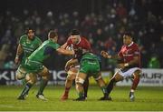 31 December 2016; Billy Holland of Munster is tackled by Matt Healy, left, and Nepia Fox-Matamua of Connacht during the Guinness PRO12 Round 12 match between Connacht and Munster at Sportsground in Galway. Photo by Brendan Moran/Sportsfile
