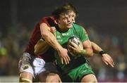 31 December 2016; Jake Heenan of Connacht is tackled by Jack O’Donoghue of Munster during the Guinness PRO12 Round 12 match between Connacht and Munster at Sportsground in Galway. Photo by Diarmuid Greene/Sportsfile