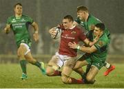 31 December 2016; Tommy O’Donnell of Munster is tackled by Peter Robb and Tiernan O’Halloran, right, of Connacht during the Guinness PRO12 Round 12 match between Connacht and Munster at Sportsground in Galway. Photo by Diarmuid Greene/Sportsfile