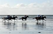 1 January 2017; Horses and jockeys in action during the Ballyheigue Races on Ballyheigue beach on the edge of the North Atlantic ocean in Co. Kerry. Photo by Brendan Moran/Sportsfile