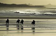 1 January 2017; Horses and jockeys in action during the Ballyheigue Races on Ballyheigue beach on the edge of the North Atlantic ocean in Co. Kerry. Photo by Brendan Moran/Sportsfile