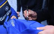 31 December 2016; Rhys Ruddock of Leinster signs a shirt at Autograph Alley at the Guinness PRO12 Round 12 match between Leinster and Ulster at the RDS Arena in Dublin. Photo by David Fitzgerald/Sportsfile