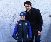 31 December 2016; Joey Carbery of Leinster poses for a photograph with a fan at Autograph Alley at the Guinness PRO12 Round 12 match between Leinster and Ulster at the RDS Arena in Dublin. Photo by David Fitzgerald/Sportsfile